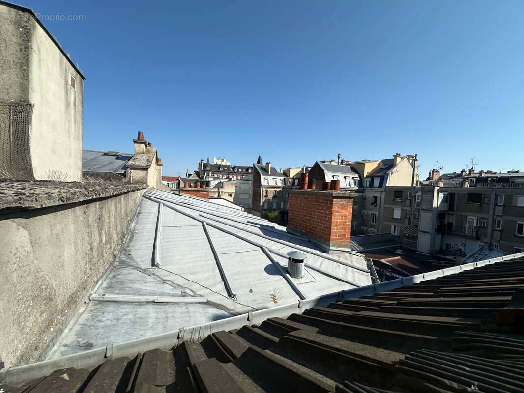 REIMS - Type 4 avec cave rue CONDORCET - photo 9