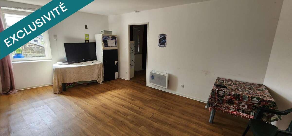 Photo 2 - Appartement à LA CHAPELLE-GLAIN