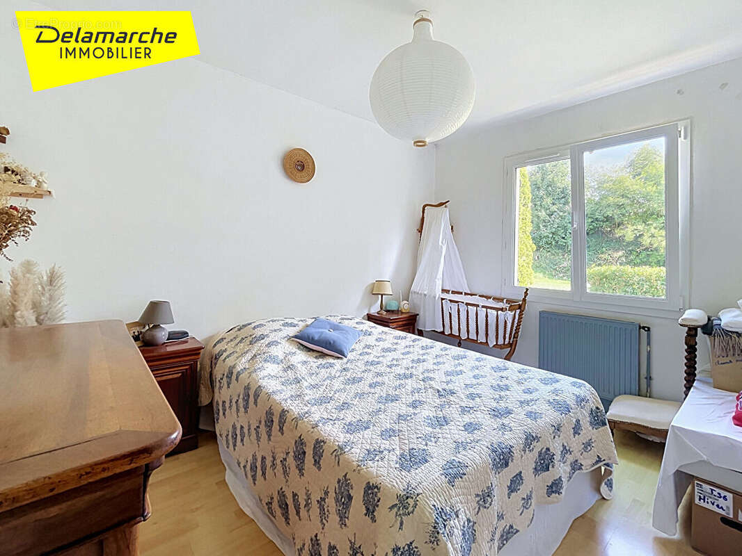A vendre maison plain pied  sur sous sol Saint Planchers - photo 7