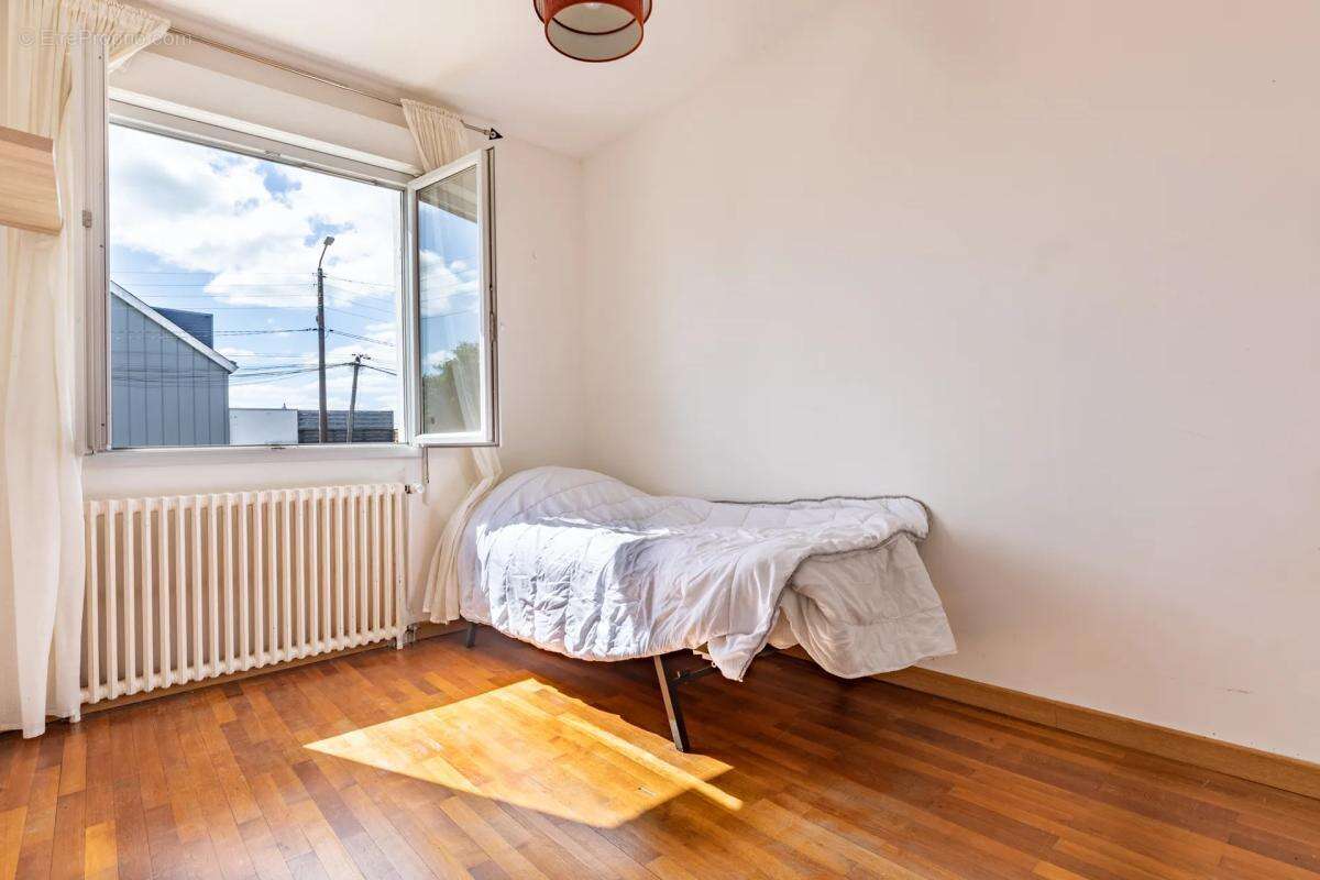 Maison de 6 pièces - 110 m2 - Saint-Herblain - photo 11