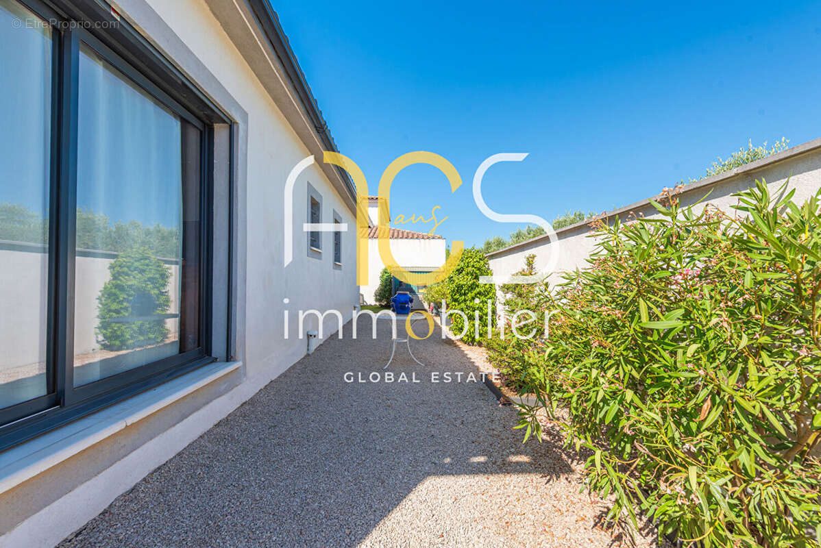 Achat Vente Maison Gignac-la-Nerthe  4 pièces 114m2 Jardin Garage - photo 6