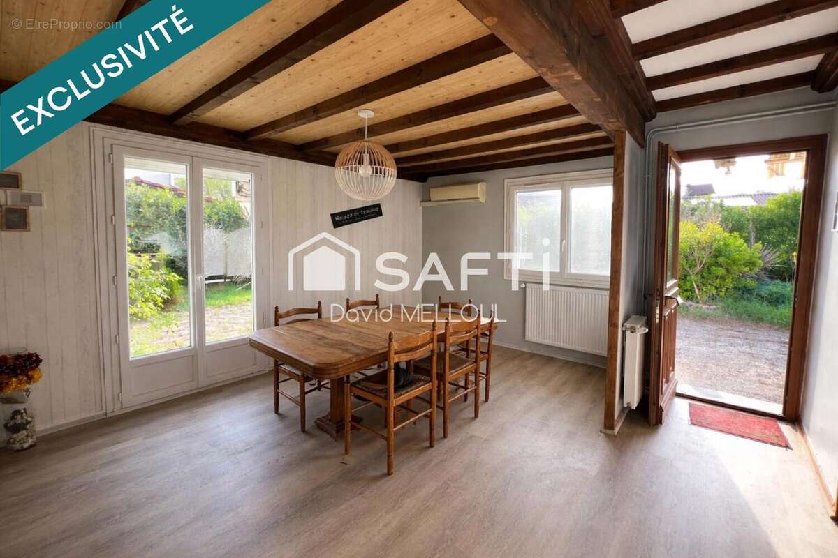 Maison 104 m² à Rignieux-Le-Franc  - photo 2