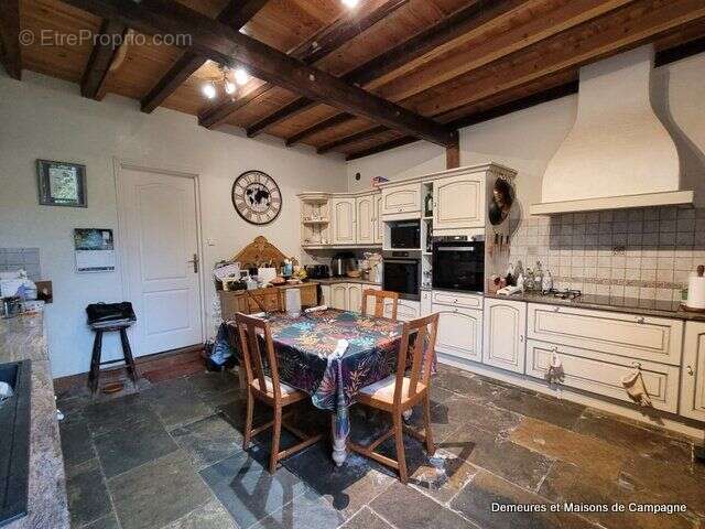 Maison 124 m² à Juvigny-Le-Tertre  - photo 5