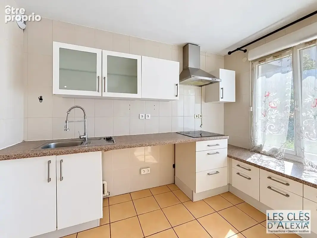 VAULX-EN-VELIN – T4 de 89,33 m² avec terrasse, jardin privatif et garage double en sus - photo 8