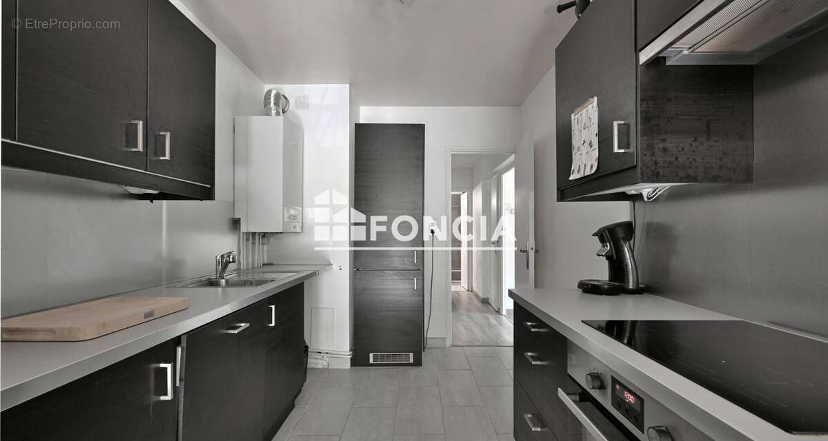 Appart f2 de 57 m2 avec terrasse de 21 m2 + cave et garage - photo 9
