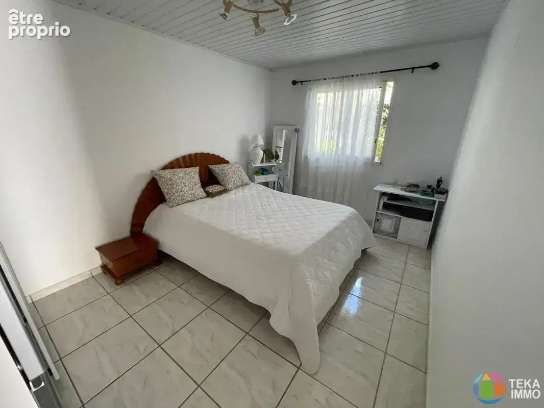 FABIEN TEKA IMMO vous propose à la vente une maison F4 mitoyenne située à Sainte Marie dans le quartier de Beaumont, ile de la R - photo 12