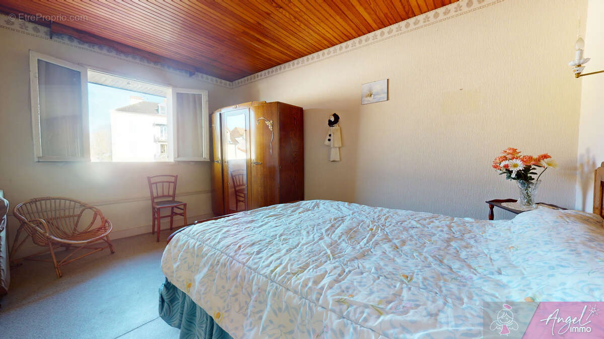 Immeuble de rapport a dole - 2 logements independants + garage + jardin - photo 18