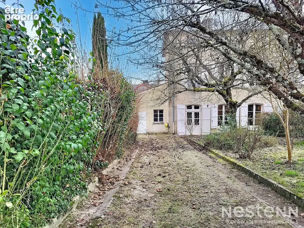 A Vendre Maison de ville en pierre rénovée avec garage et jardin à proximité immédiate du centre-ville - photo 14