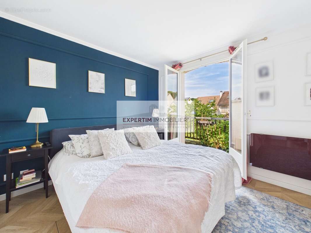 Maison 135 m² à Noisy-Le-Roi  - photo 6
