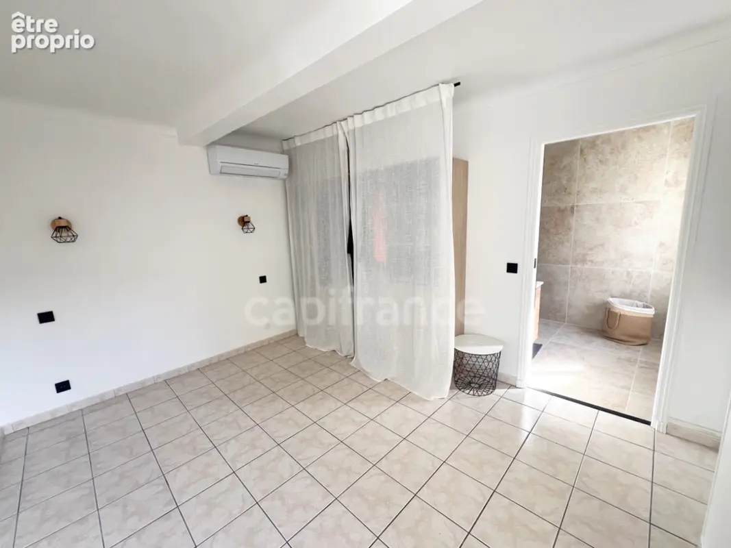 À Vendre Manosque centre historique – Maison de ville 3 pièces avec 2 chambres, garage et cave - photo 7