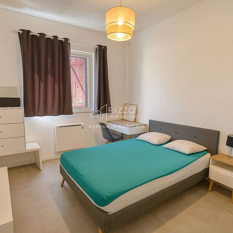 PERON   Appartement T4 avec terrasse, jardin et 2 parkings - photo 9