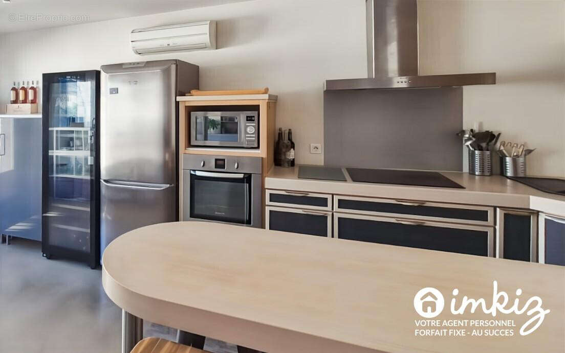 Appt. T4 en duplex dans maison de village - Garage - photo 6