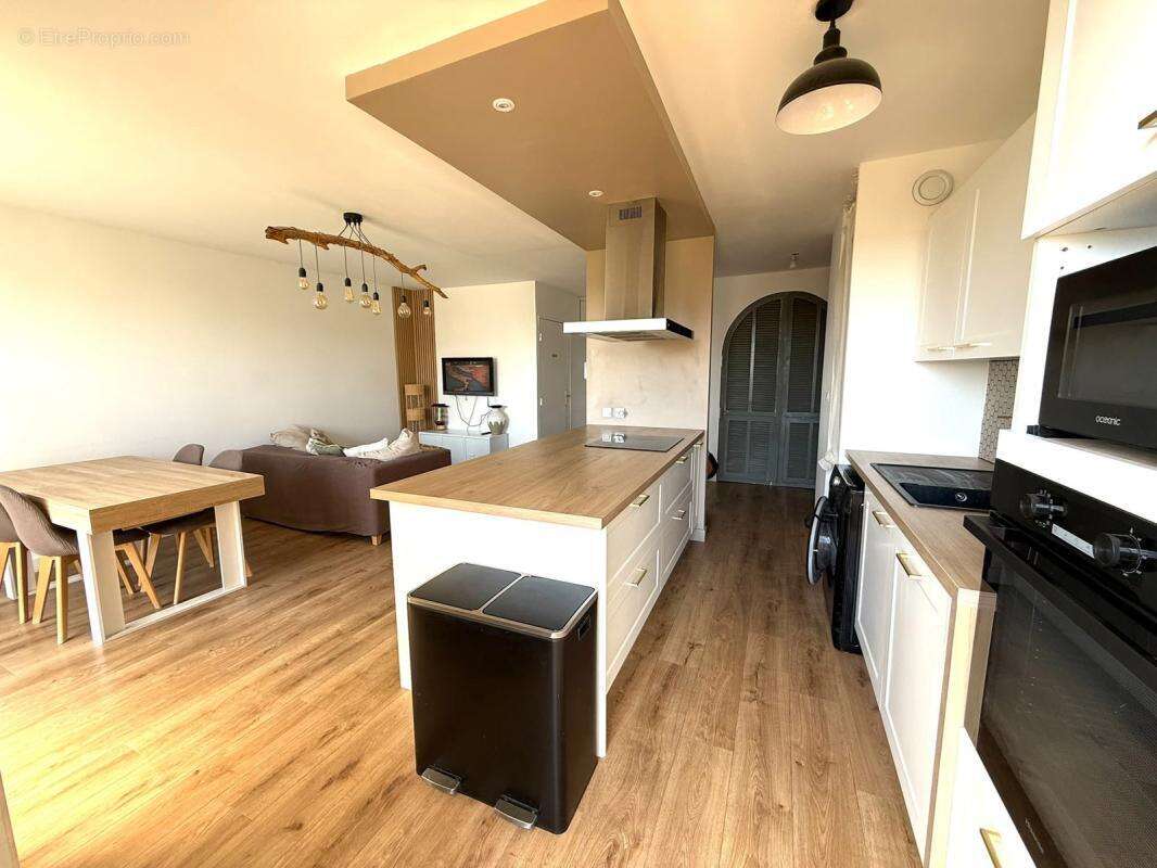 Appartement 65 m² 2 chambres terrasse garage et piscine - photo 4