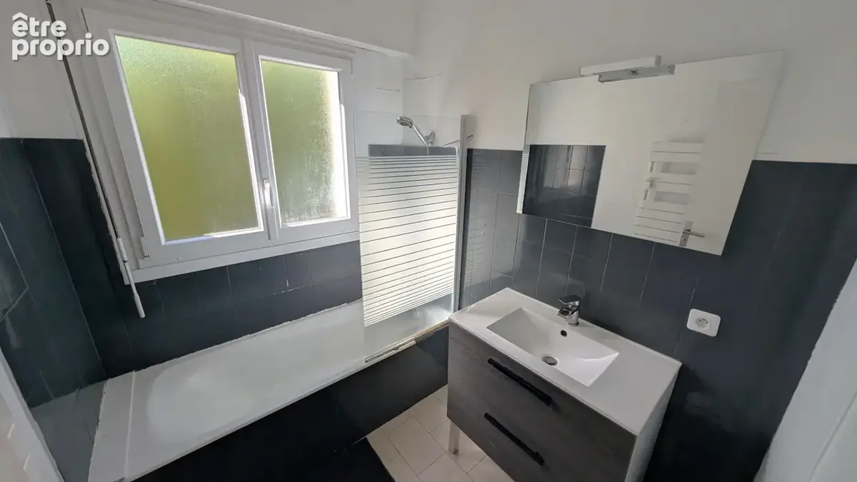 Agréable appartement T2 au calme très proche  centre ville avec parking - photo 7