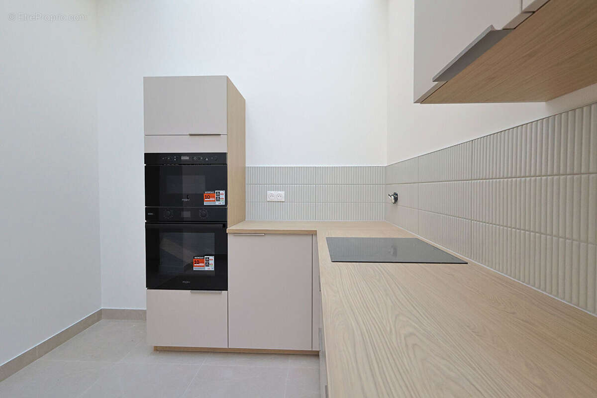 COEUR DE VILLE - Appartement de standing avec terrasse & parking - photo 2