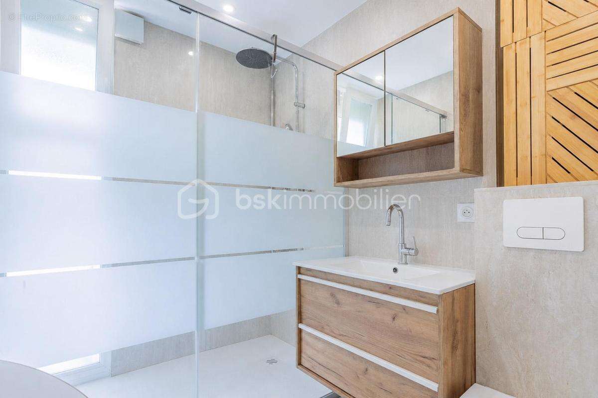 Appartement T3 en rez-de jardin avec loggia - photo 5