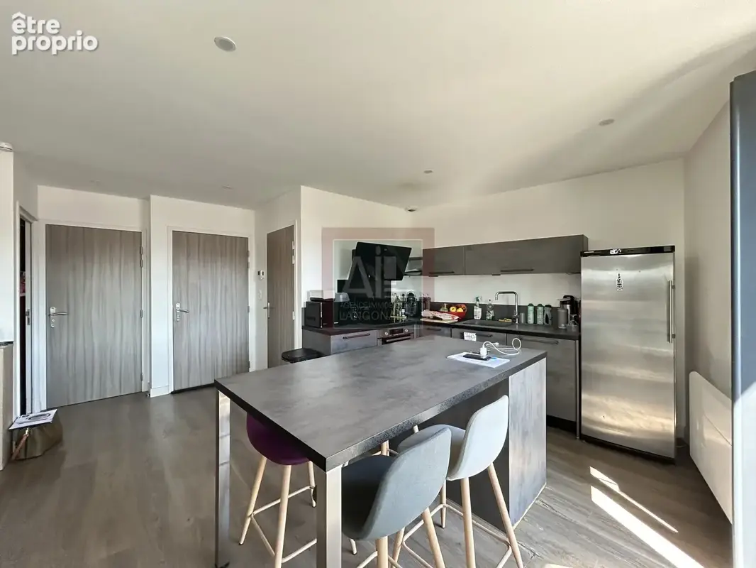 Duplex T4 de 79 m2   Centre-ville de Langogne - photo 3