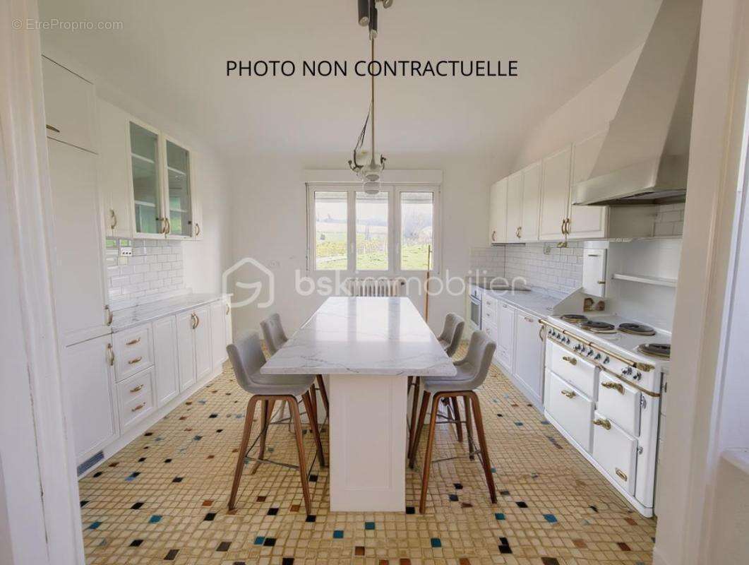 Maison à JUVIGNY-LE-TERTRE