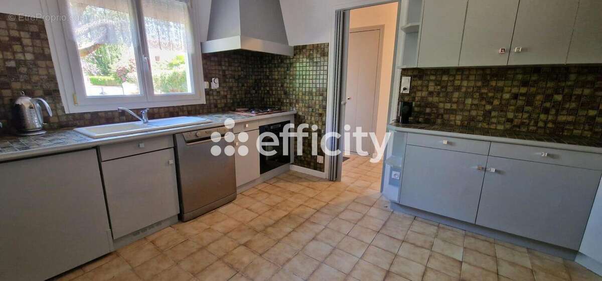 Maison 104 m² à L'isle-D'espagnac  - photo 6