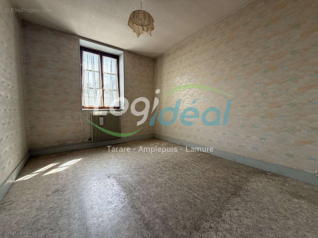 Maison de ville à rénover - photo 2