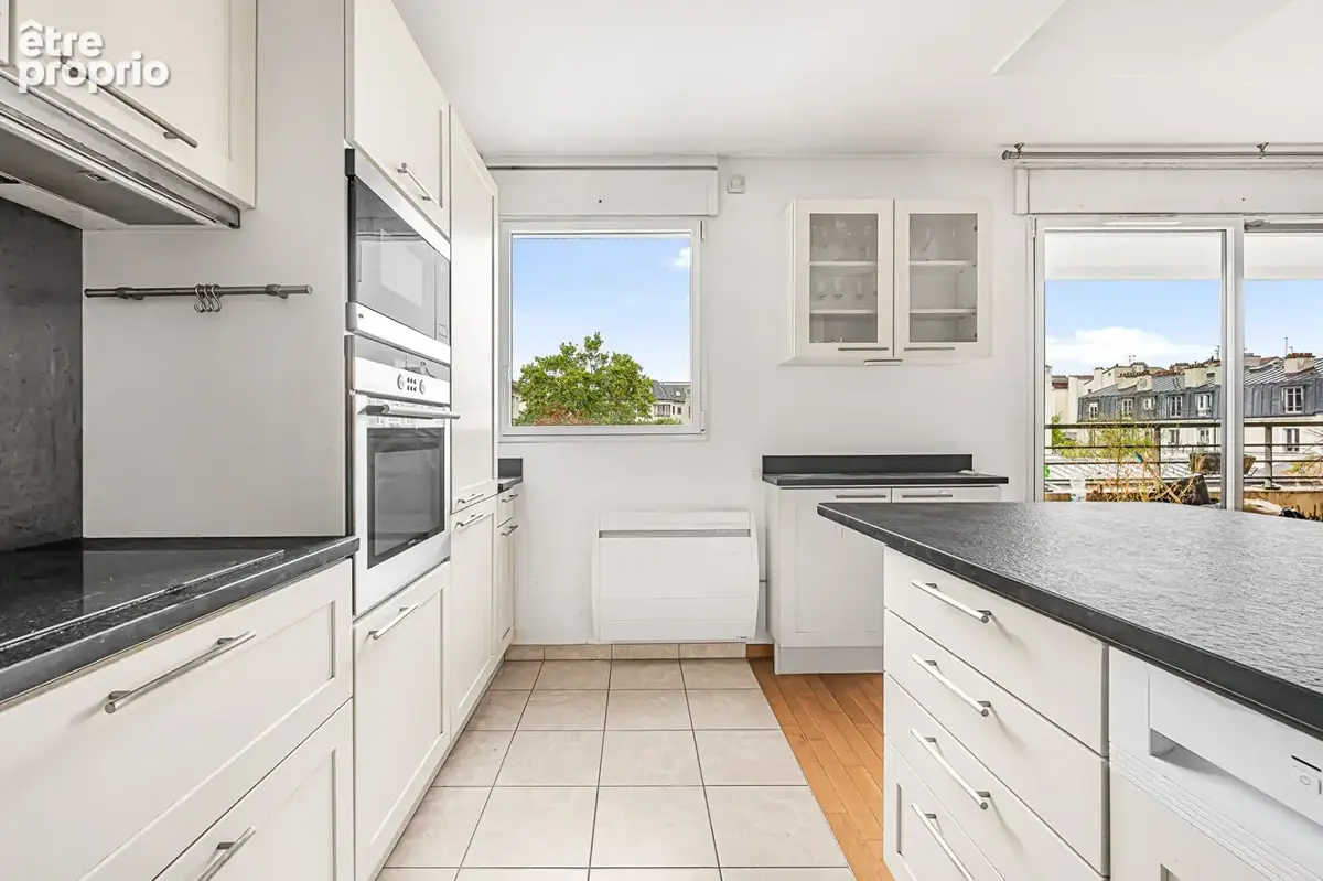Appartement familial 4 pièces - 92,45 m² avec terrasse, parking et 2 caves - Pernety - photo 5