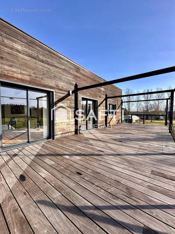 Photo 1 - Maison à VILLEFRANCHE-DE-LONCHAT