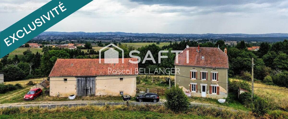 Photo 1 - Maison à ECHASSIERES