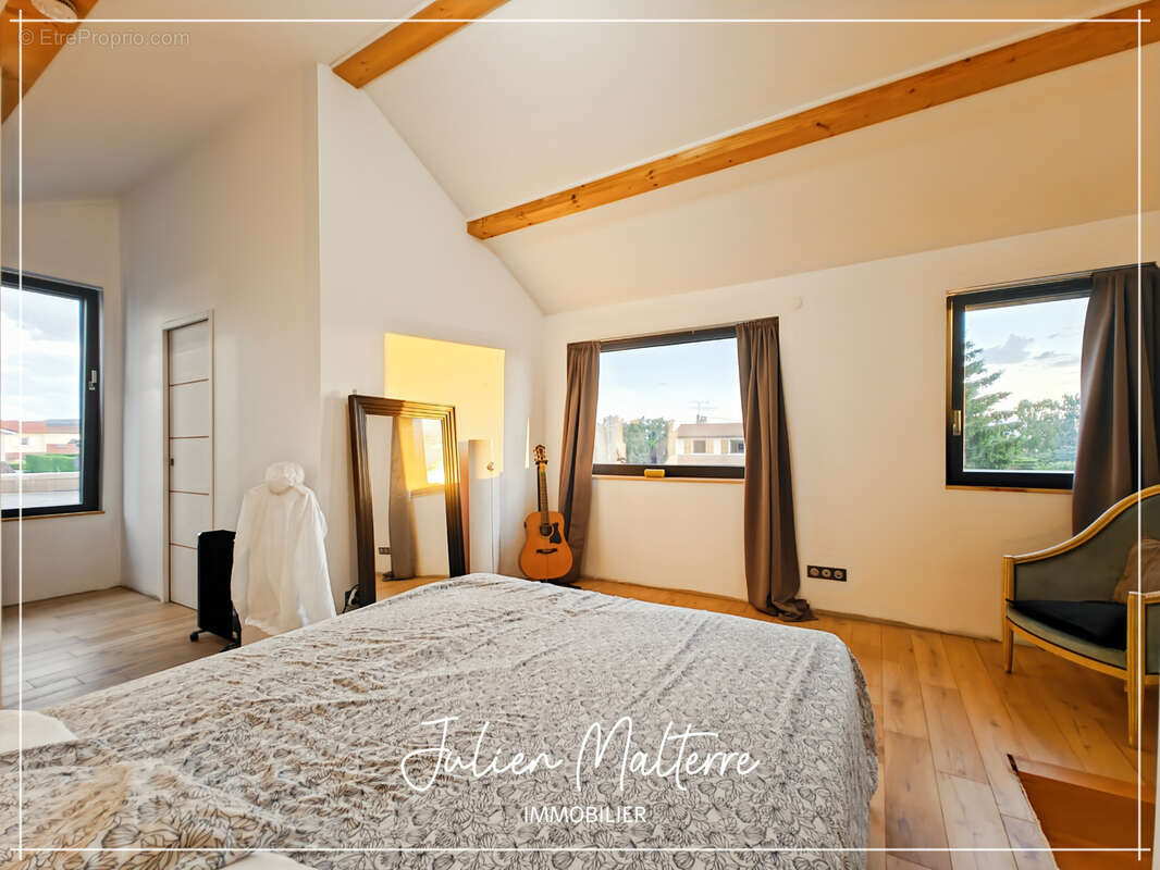 St-Just-St-Rambert, maison d'architecte 147 m², 4 chambres, garage double sur terrain de 985 m² - photo 18