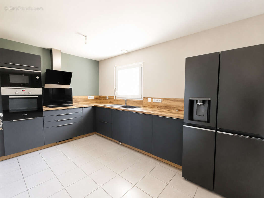 Photo 3 - Maison à VOUILLE
