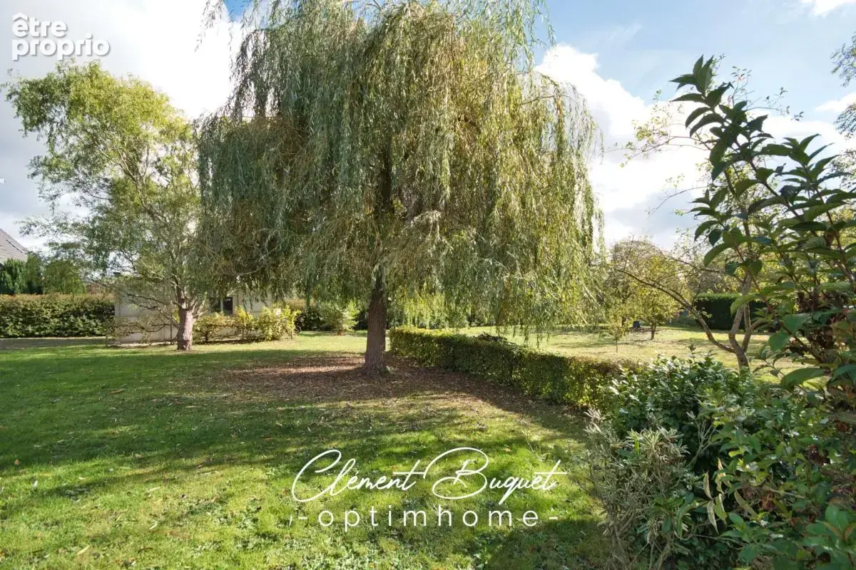  LE FAVRIL – Le confort d’une maison récente, le charme d’un grand jardin !  - photo 14