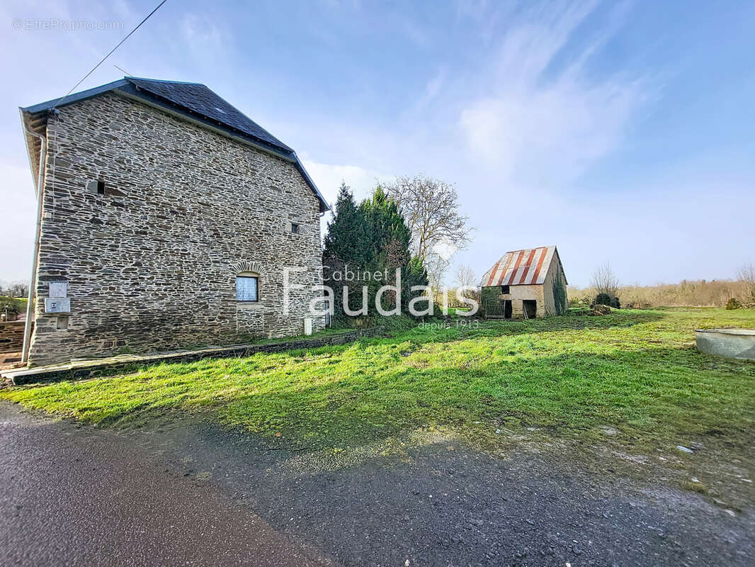 Maison à QUIBOU