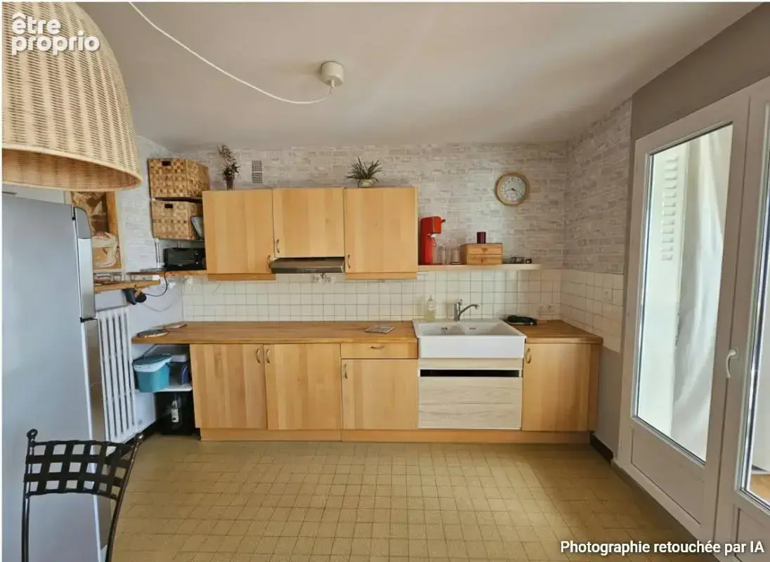 Firminy 42700 appartement T2 de 60,9m² habitables une chambre place de garage et cave - photo 2