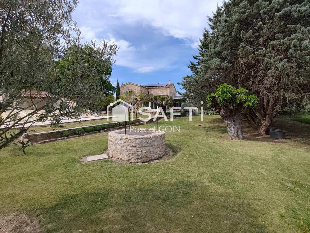 Photo 1 - Maison à SAINT-JEAN-DE-MARUEJOLS-ET-AVEJAN