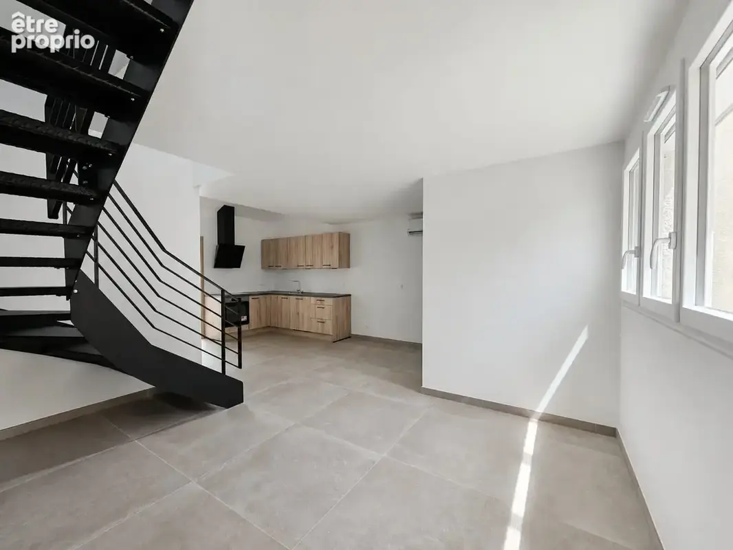 A vendre appartement duplex T4 climatisé centre-ville BELLEY. - photo 2