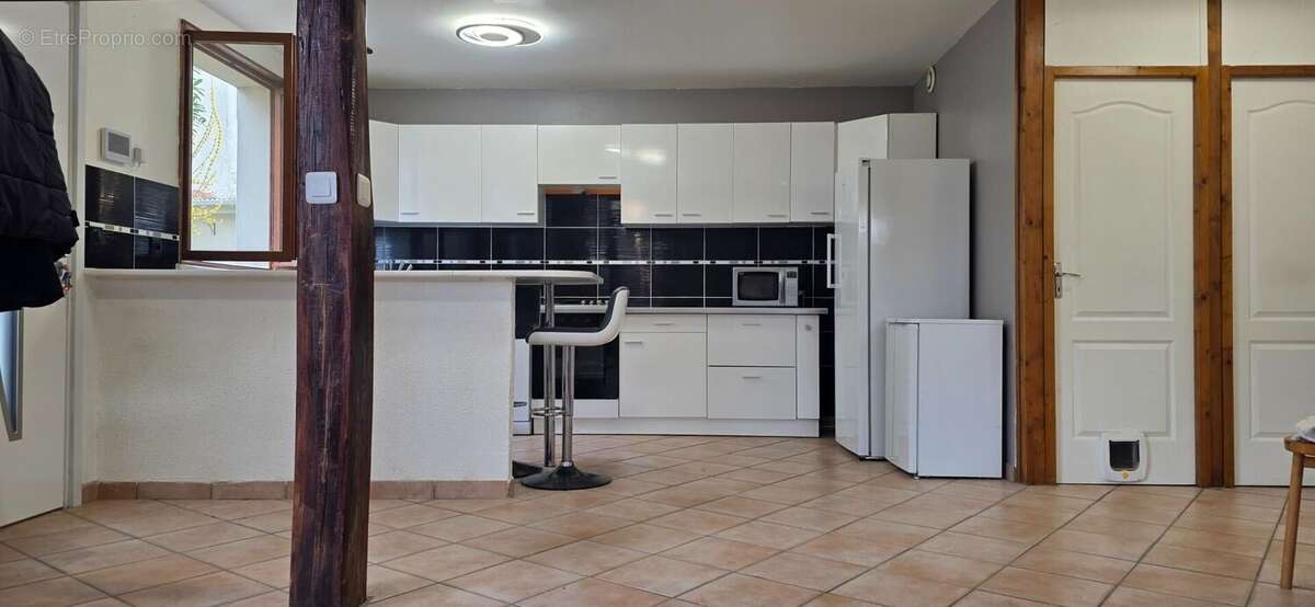 Maison 106 m² à Pouillon  - photo 4