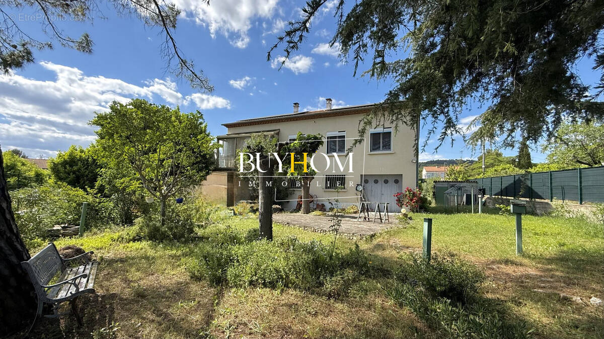 Maison à LAUDUN-L'ARDOISE
