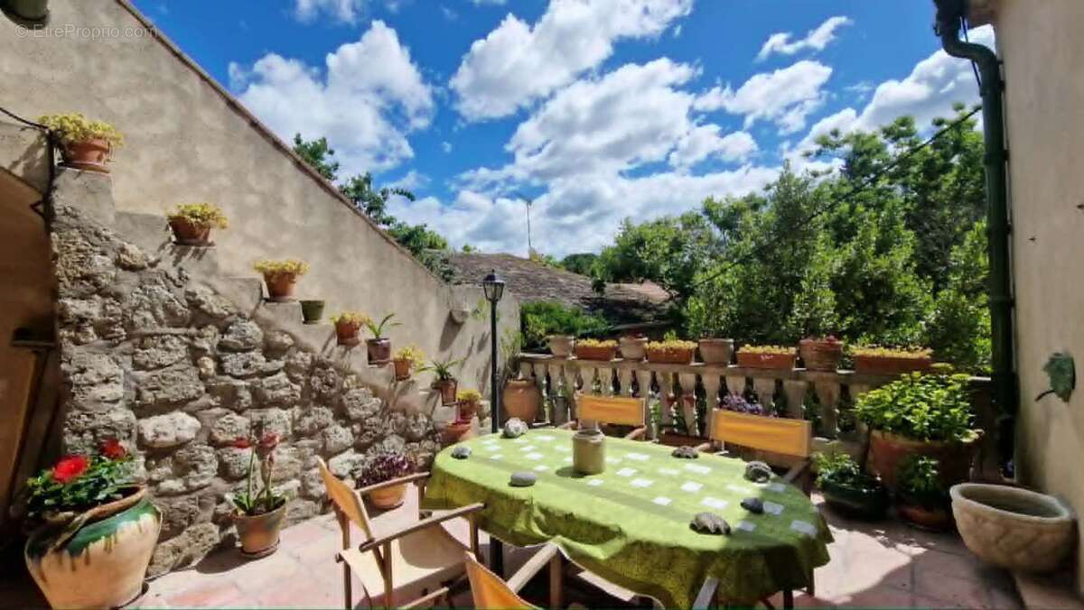Maison type vigneronne avec garage et terrasses - photo 4