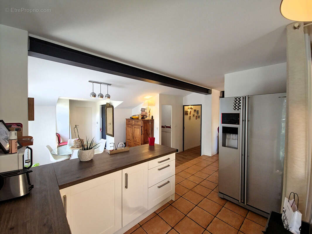 Maison familiale avec 3 chambres et jardin intimiste, proche commerces à Lavernose-Lacasse - photo 6