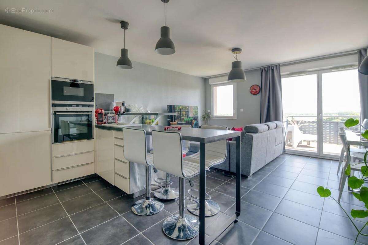 Appartement 3 pièces de 61,8 m² situé à Deyme - photo 5