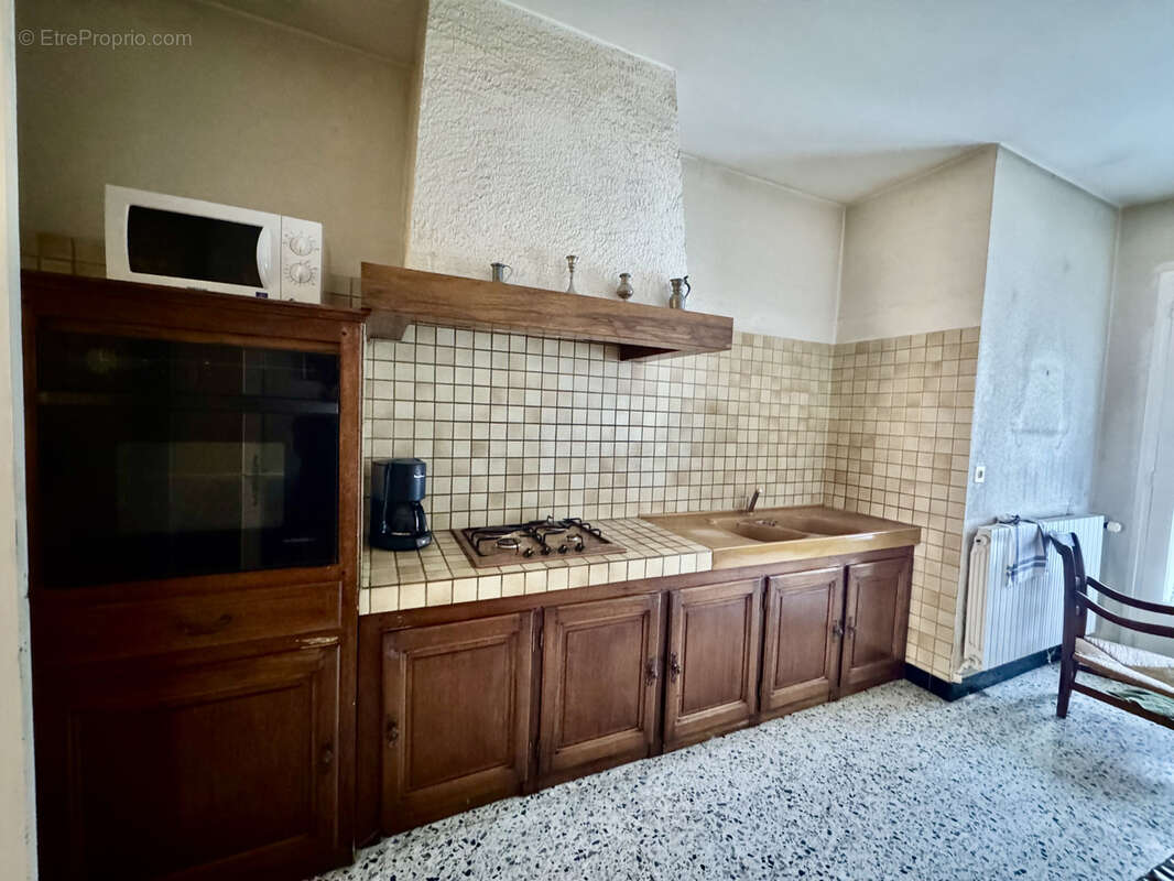 Maison à LAUDUN-L&#039;ARDOISE