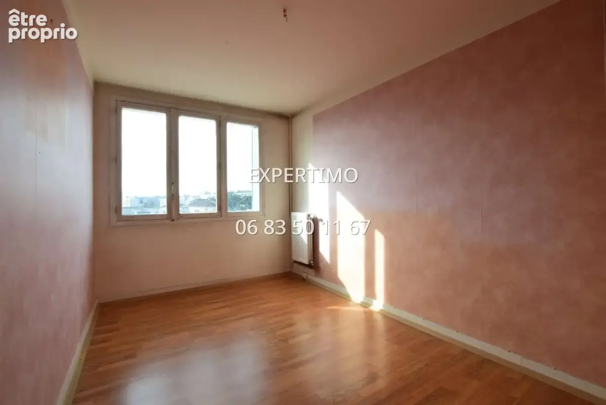 Appartement lumineux - 3 chambres poss. 4 - fort potentiel - photo 8