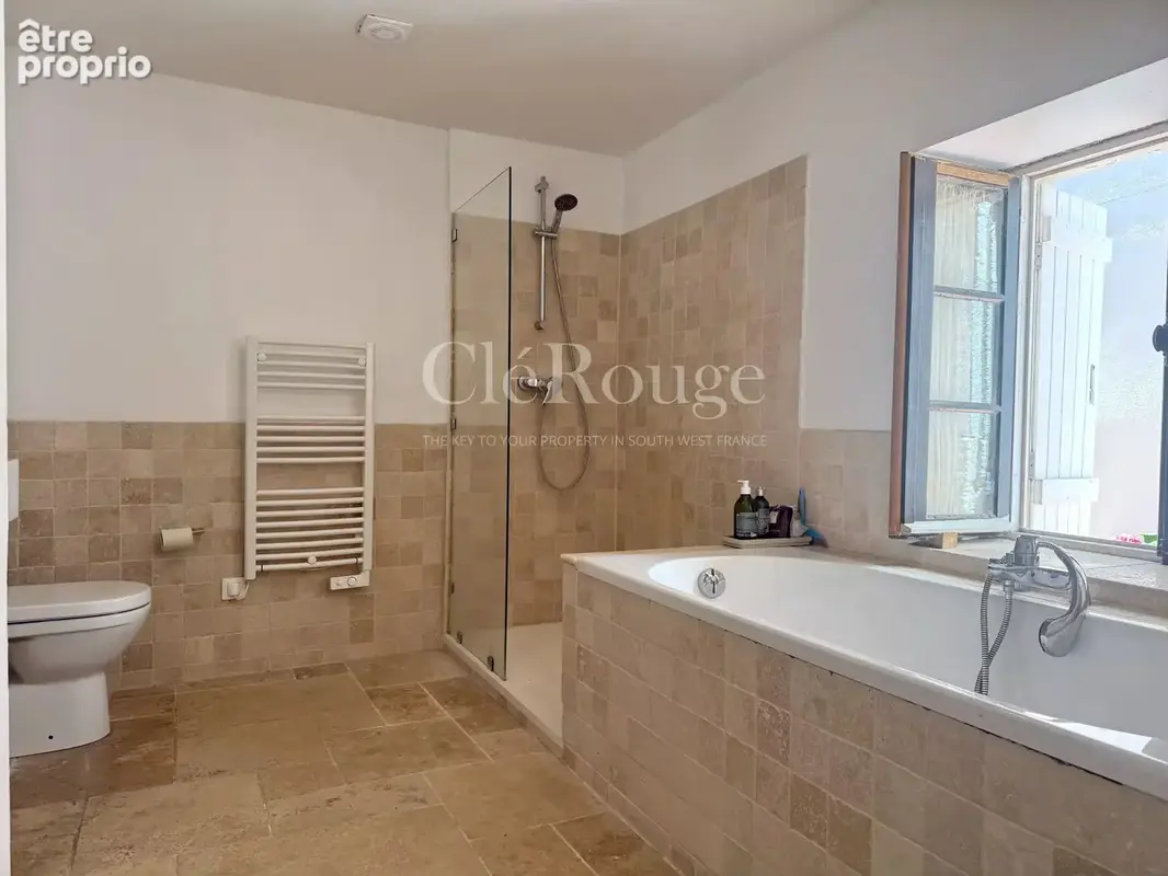 Au cœur d’Eymet – Maison de caractère avec grange et cour plein sud - photo 11