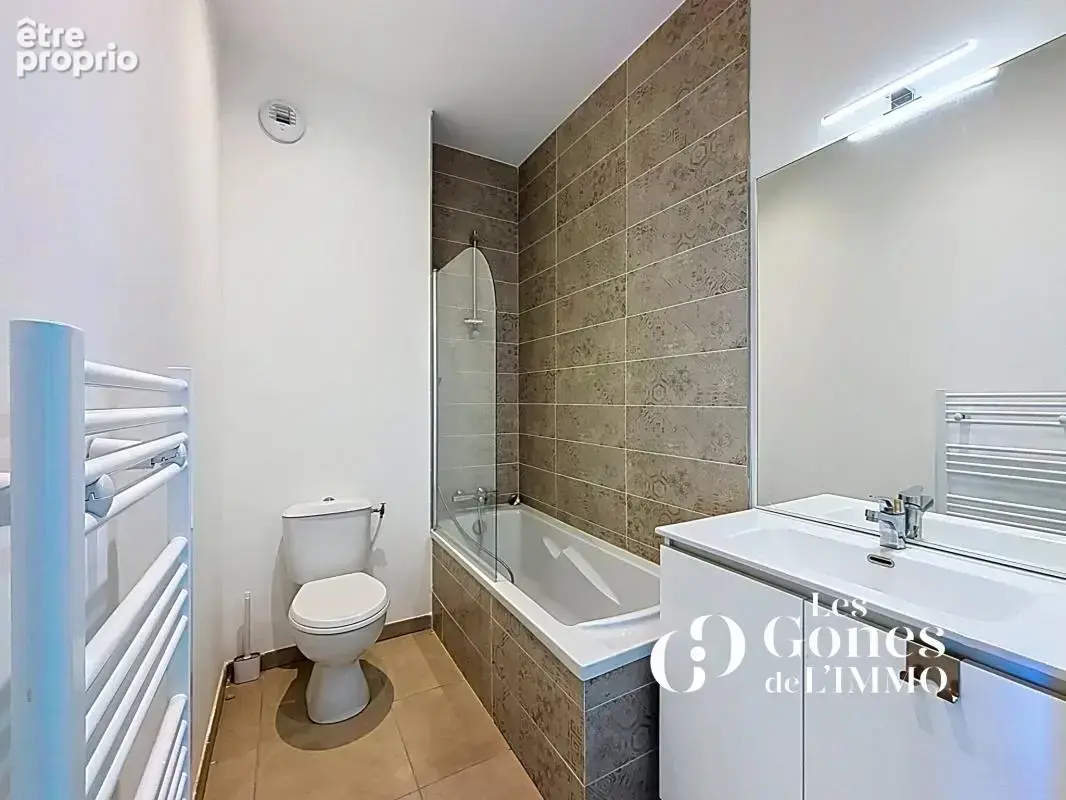 CRAPONNE   Un duplex familial de 102 m2 avec 3 chambres et d - photo 14