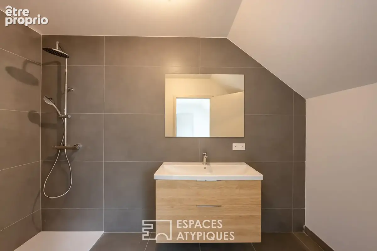 Loft contemporain en duplex et sa terrasse dans une ancienne friche industrielle - photo 10
