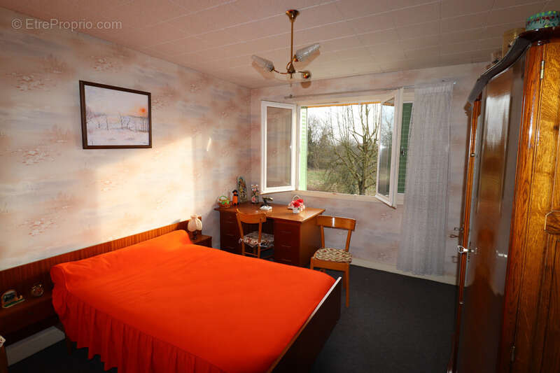 Jolie villa de 117 m² à fort potentiel avec un beau terrain arboré à CURCIAT DONGALON (01) - photo 9