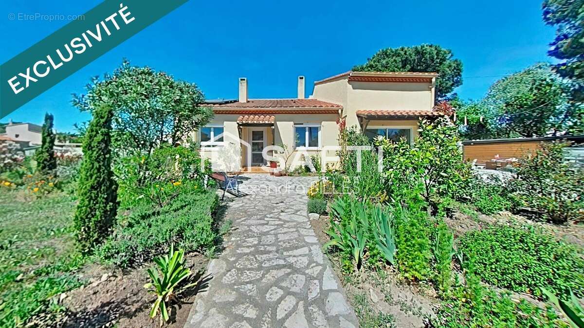 Photo 2 - Maison à SAINT-ANDRE