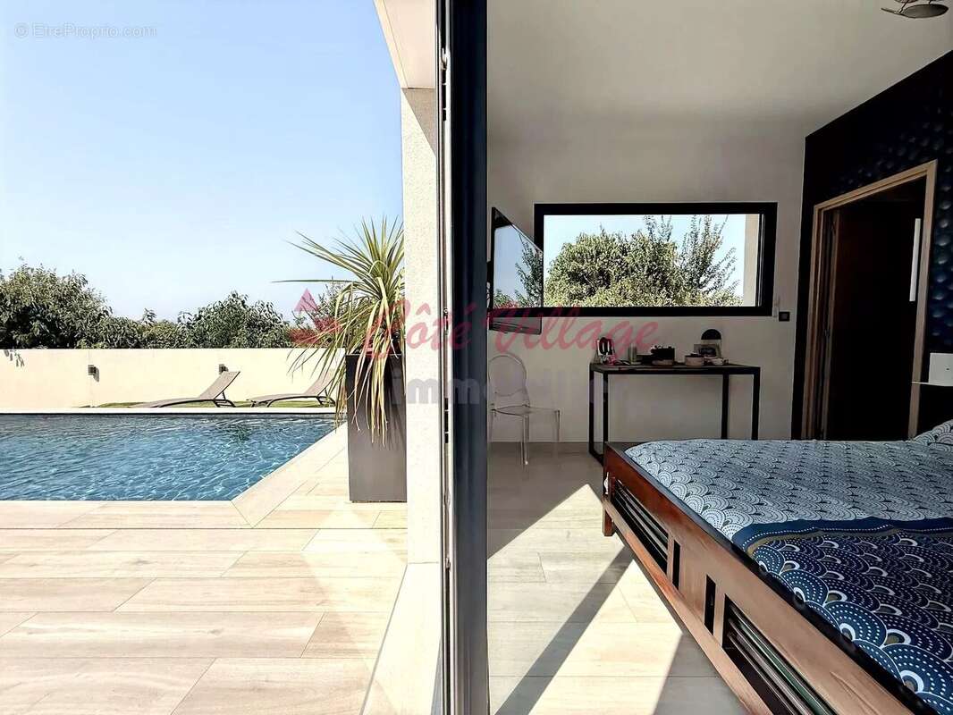 Superbe maison de plain-pied avec vue dégagée , piscine et garage - photo 10