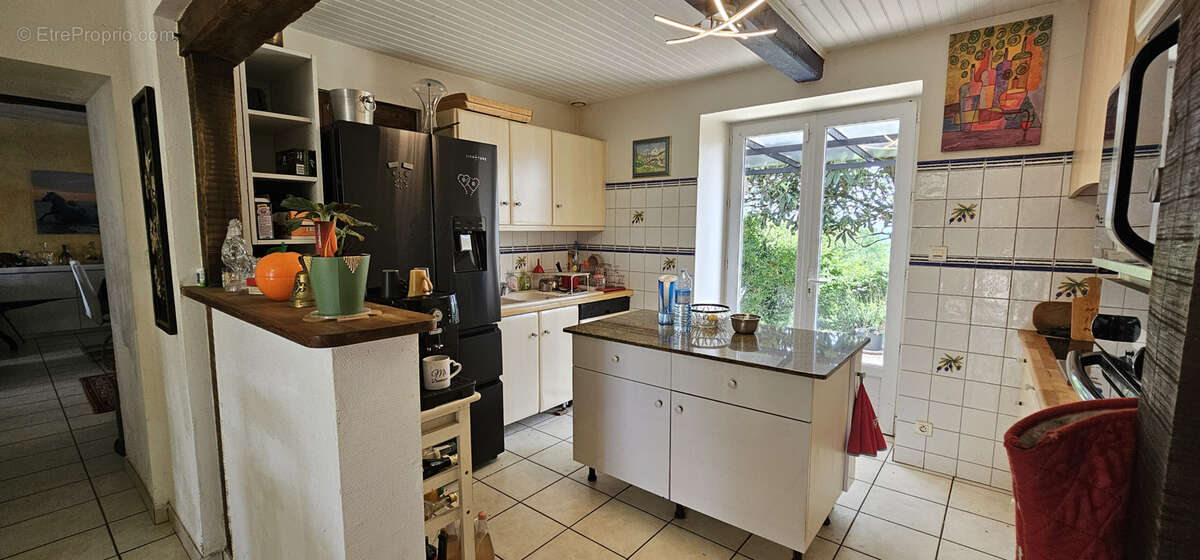 Maison à CASTELNAU-D'AUZAN