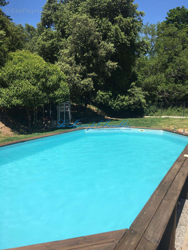Entre ANDUZE et LASALLE, grande maison de 187 m2 hab F6  sur 1280 lm2 de terrain avec piscine - photo 14