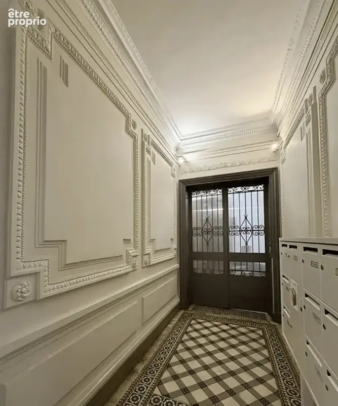 T4 de 129 m2 immeuble haussmannien bx-centre - photo 9